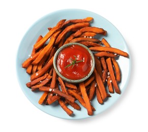 Photo of Plate with delicious sweet potato fries and sauce on white background, top view