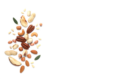 Different delicious nuts on white background, flat lay. Space for text