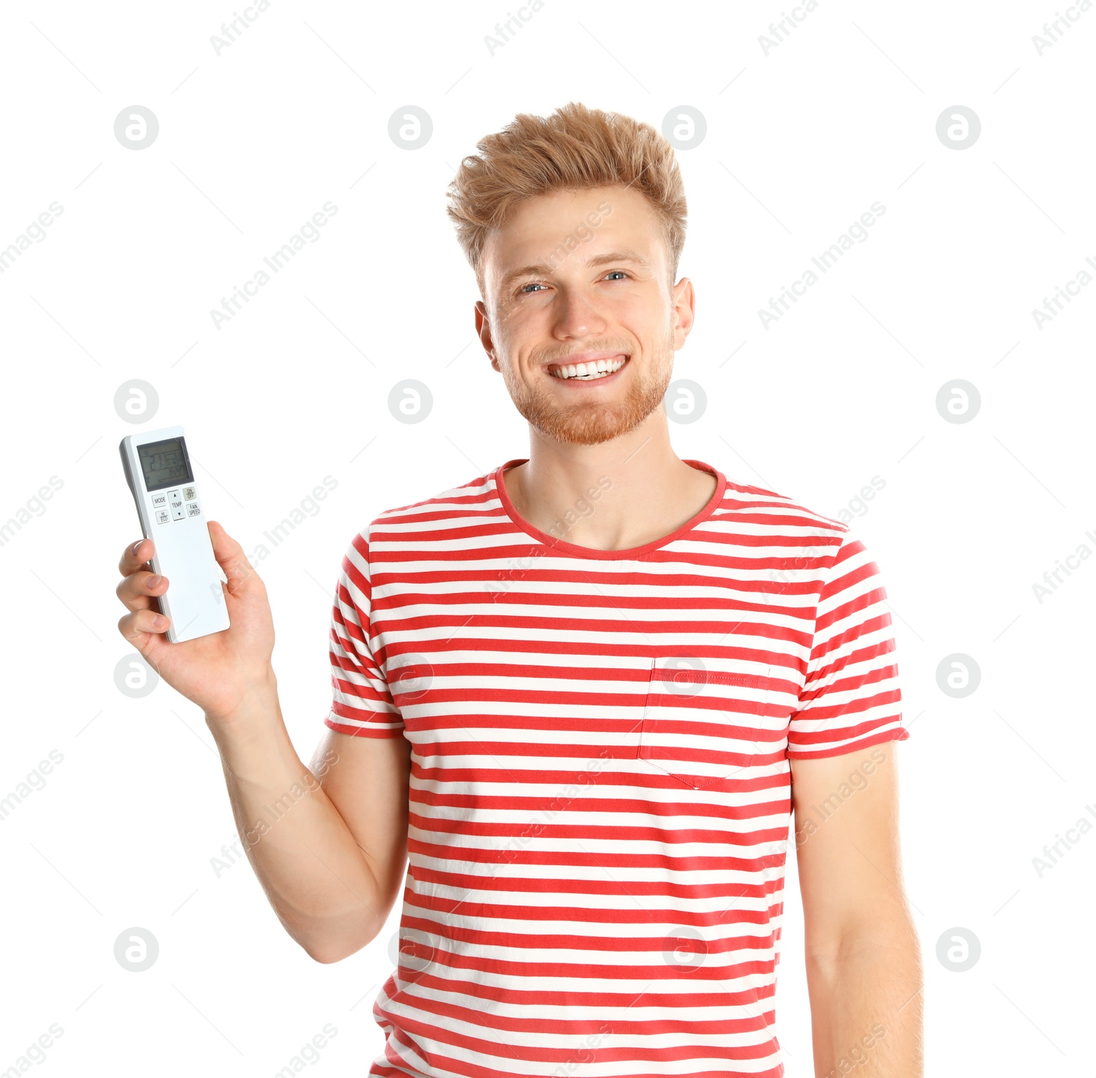 Photo of Young man with air conditioner remote on white background