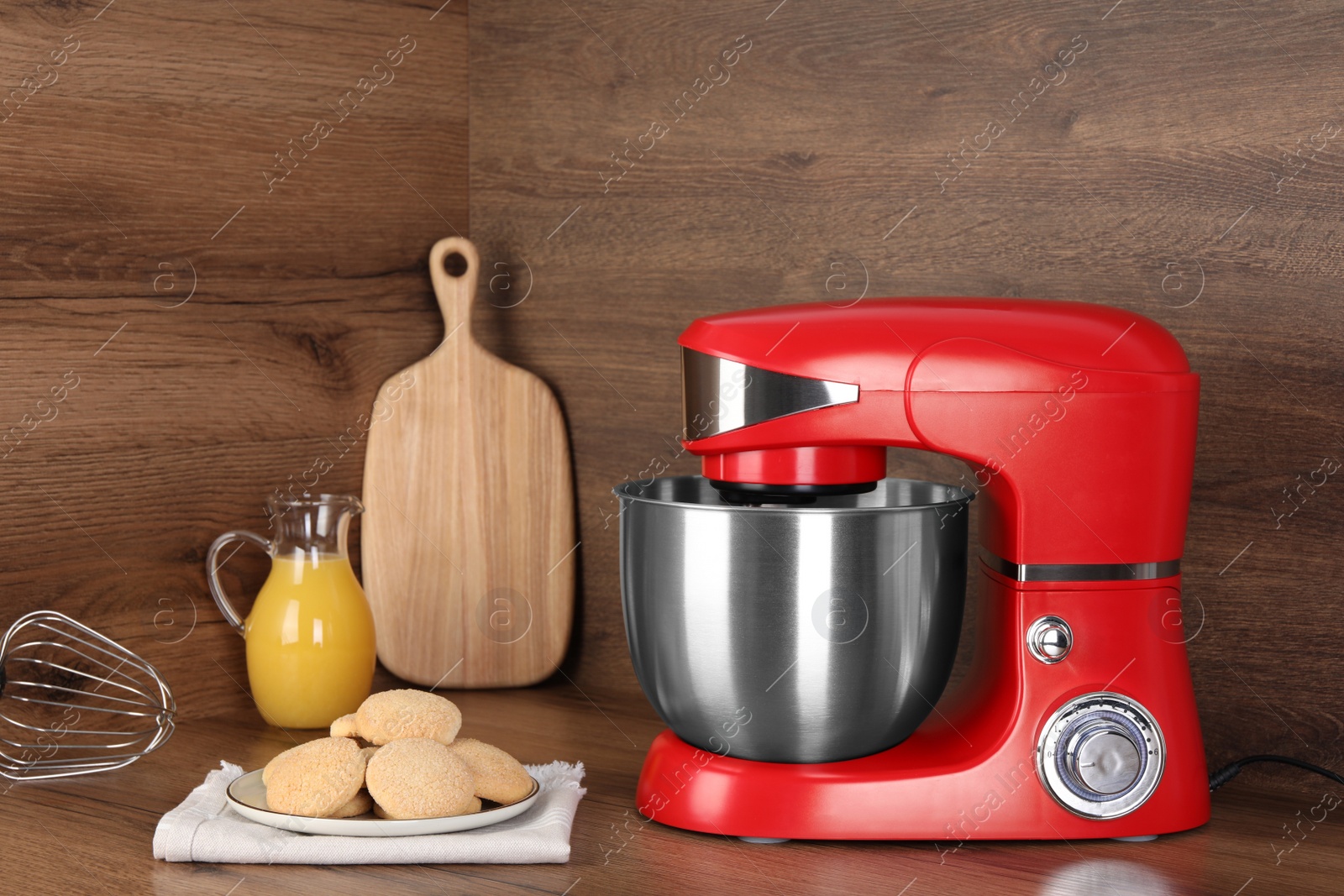 Photo of Composition with modern red stand mixer and different products on wooden table