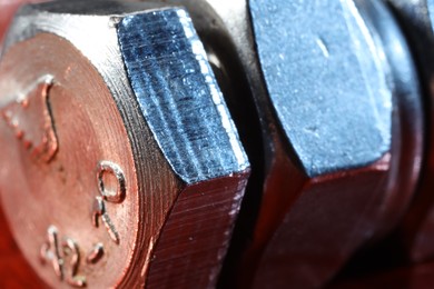 Photo of Texture of modern metal fasteners, macro view
