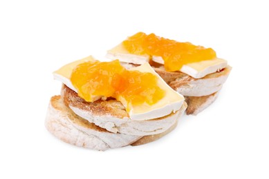 Photo of Tasty sandwiches with brie cheese and apricot jam isolated on white