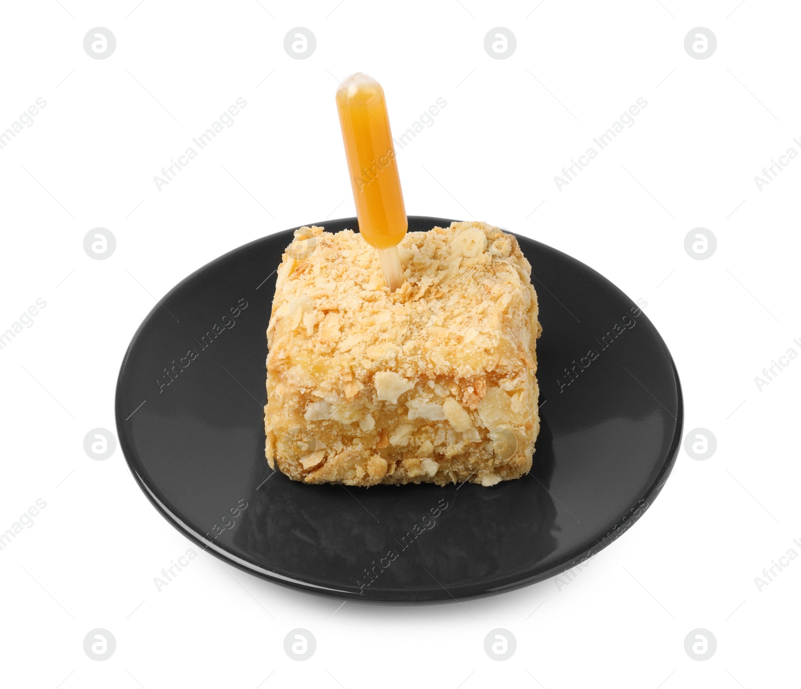 Photo of Piece of Napoleon cake with jam pipette on white background