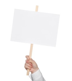 Woman holding blank protest sign on white background, closeup