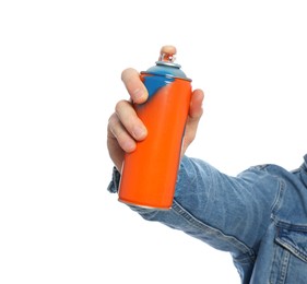 Man holding can of spray paint on white background, closeup