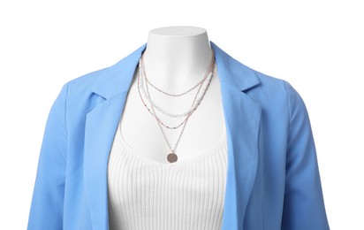 Photo of Female mannequin dressed in light blue jacket and top with necklace isolated on white. Stylish outfit