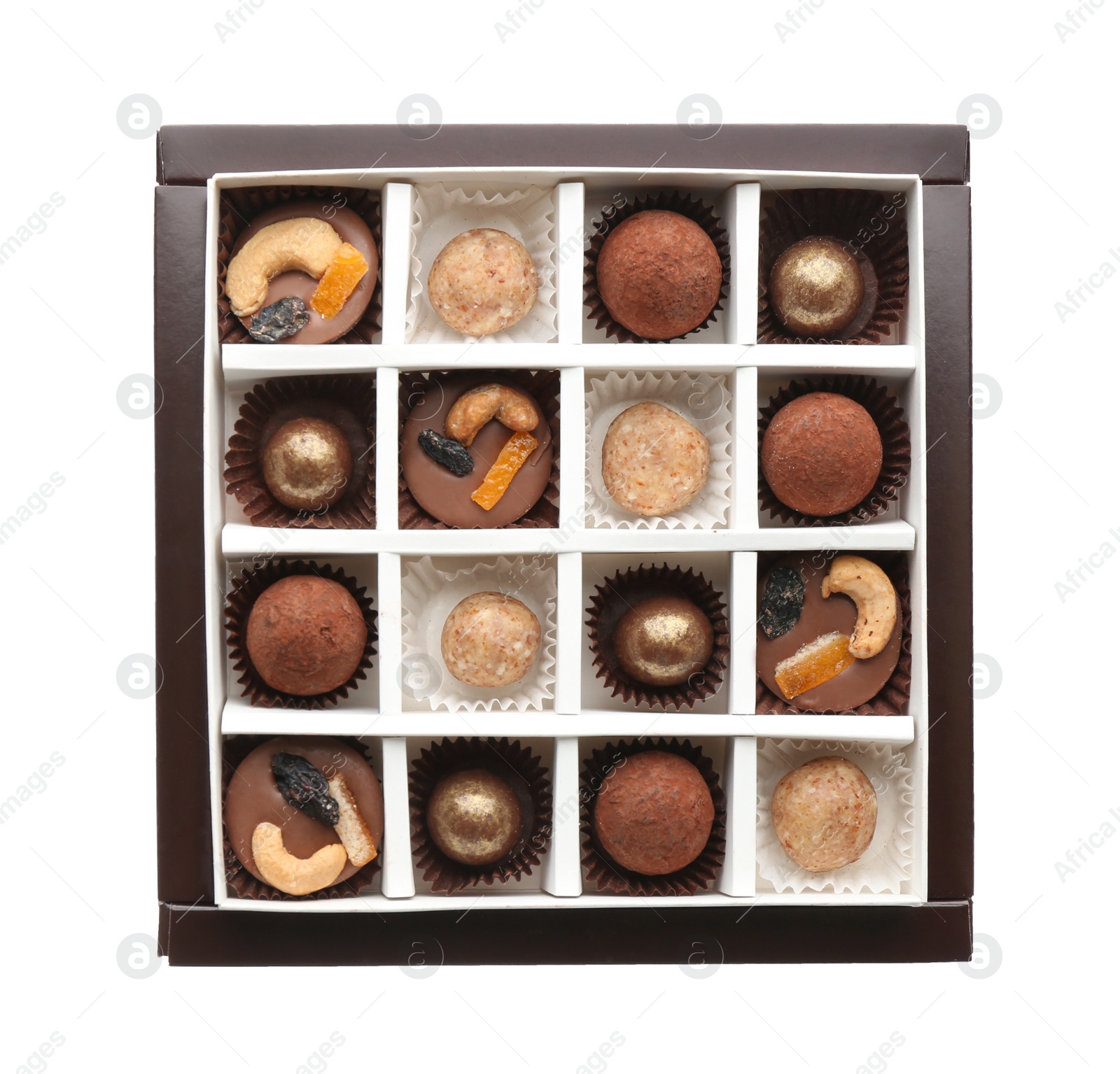 Photo of Delicious chocolate candies in box on white background, top view
