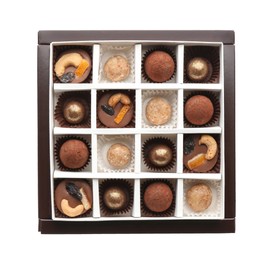 Photo of Delicious chocolate candies in box on white background, top view