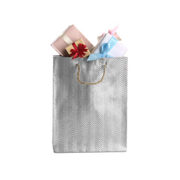 Photo of Shopping paper bag with presents isolated on white