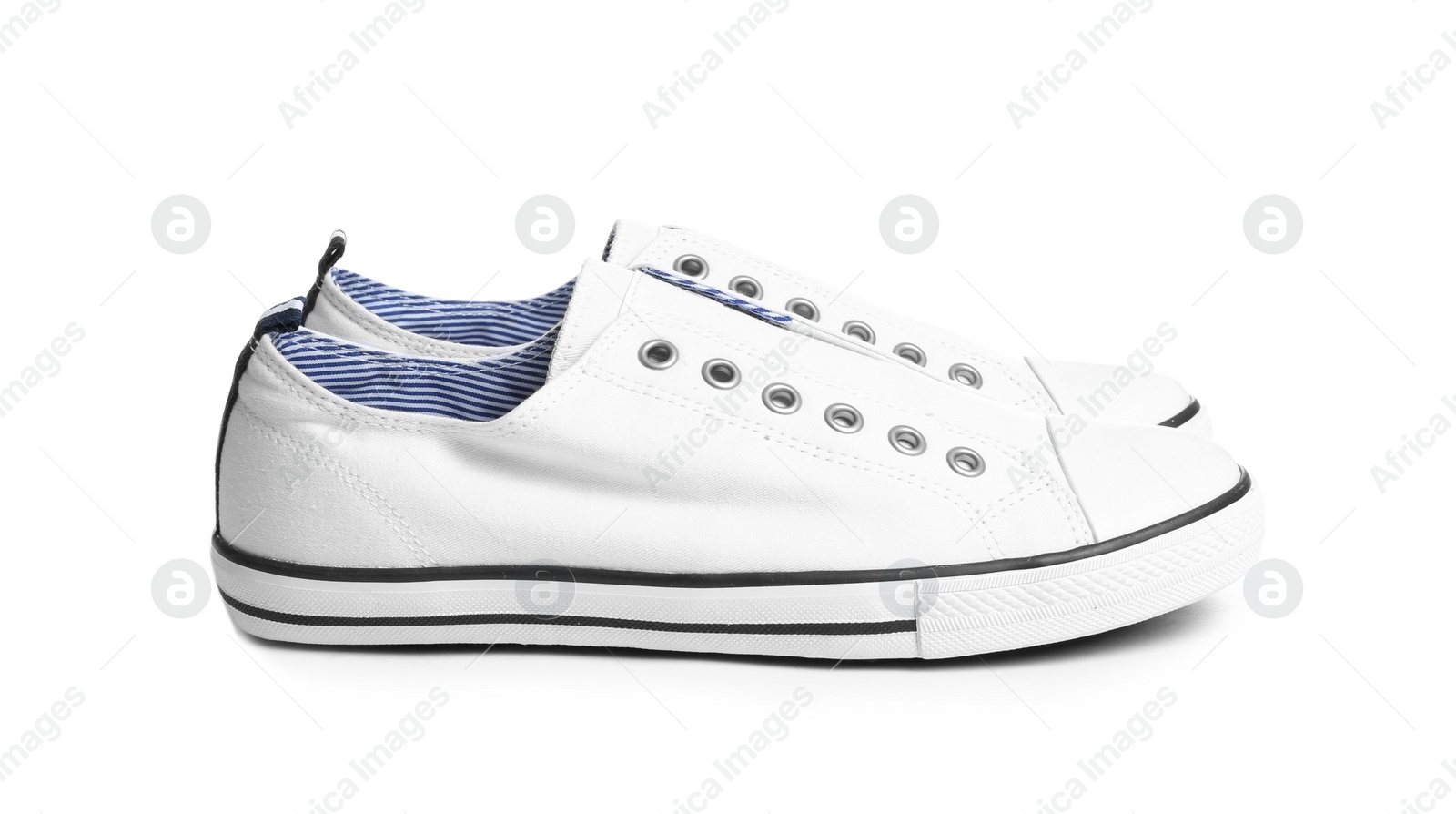 Photo of Pair of stylish sneakers on white background