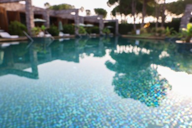 Photo of Outdoor swimming pool at resort, blurred view