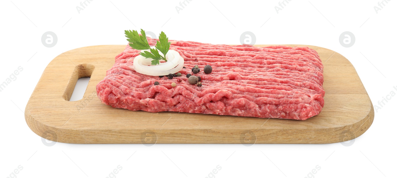 Photo of Board with raw ground meat, onion, peppercorns and parsley isolated on white