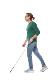 Photo of Blind man in dark glasses with walking cane on white background