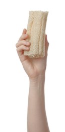Photo of Woman holding natural loofah on white background, closeup. Conscious consumption