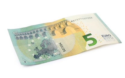 Photo of Five Euro banknote lying on white background