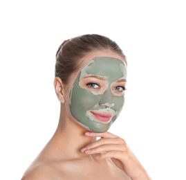 Photo of Beautiful woman with clay mask on her face against white background