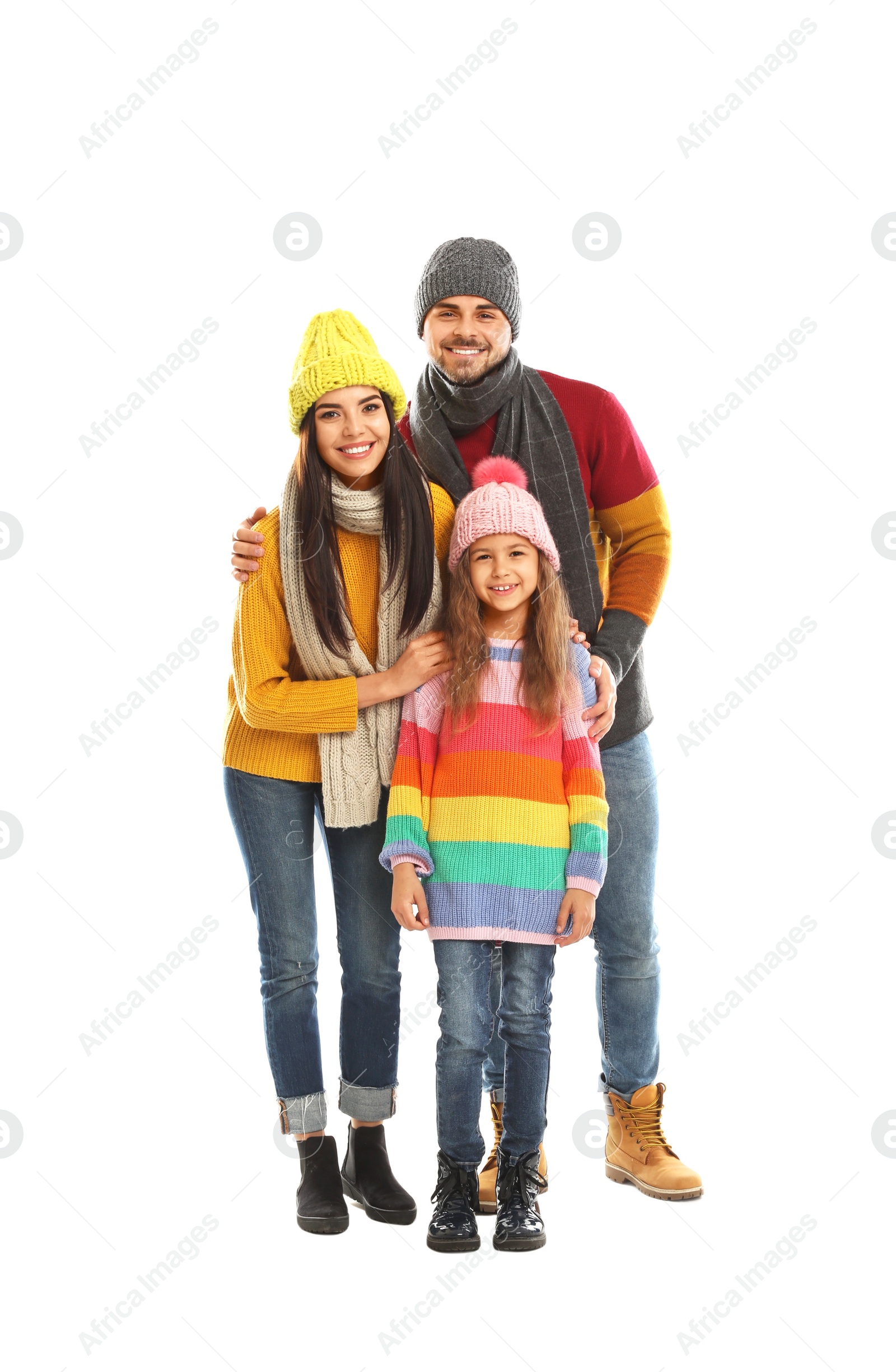 Photo of Happy family in warm clothes on white background. Winter vacation