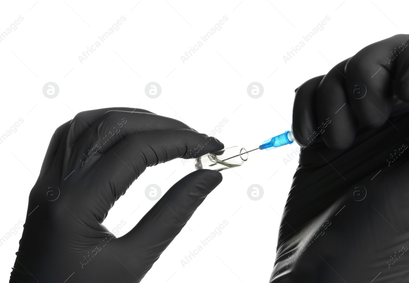 Photo of Doctor in medical gloves with syringe and ampoule on white background