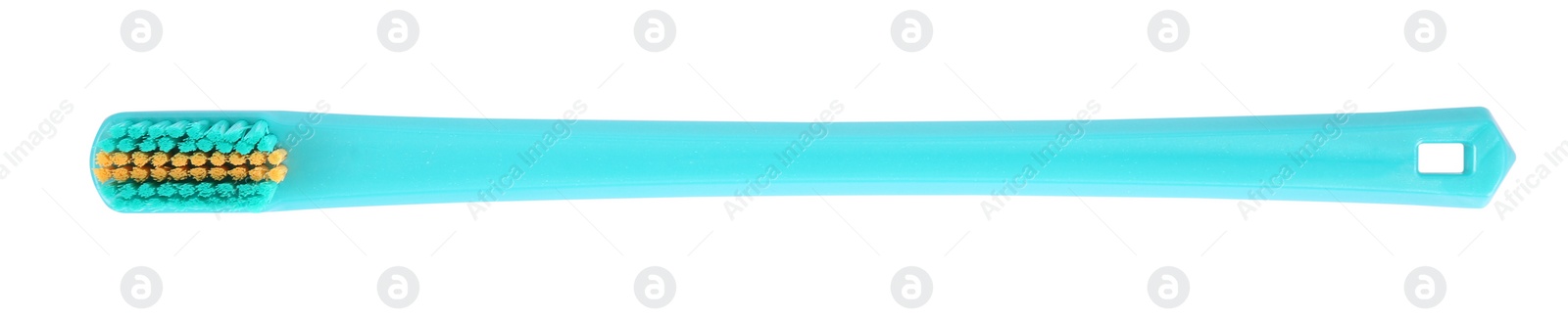 Photo of Turquoise plastic toothbrush isolated on white, top view