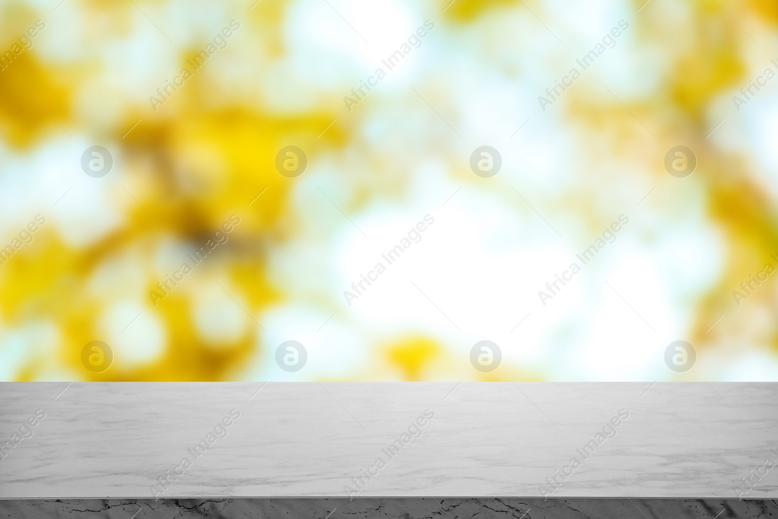 Image of Empty marble surface against blurred background. Bokeh effect