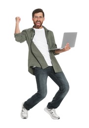 Photo of Happy handsome man with laptop on white background