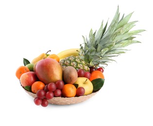 Photo of Assortment of fresh exotic fruits in bowl on white background