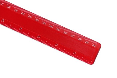 Photo of Ruler with measuring length markings in centimeters isolated on white, top view