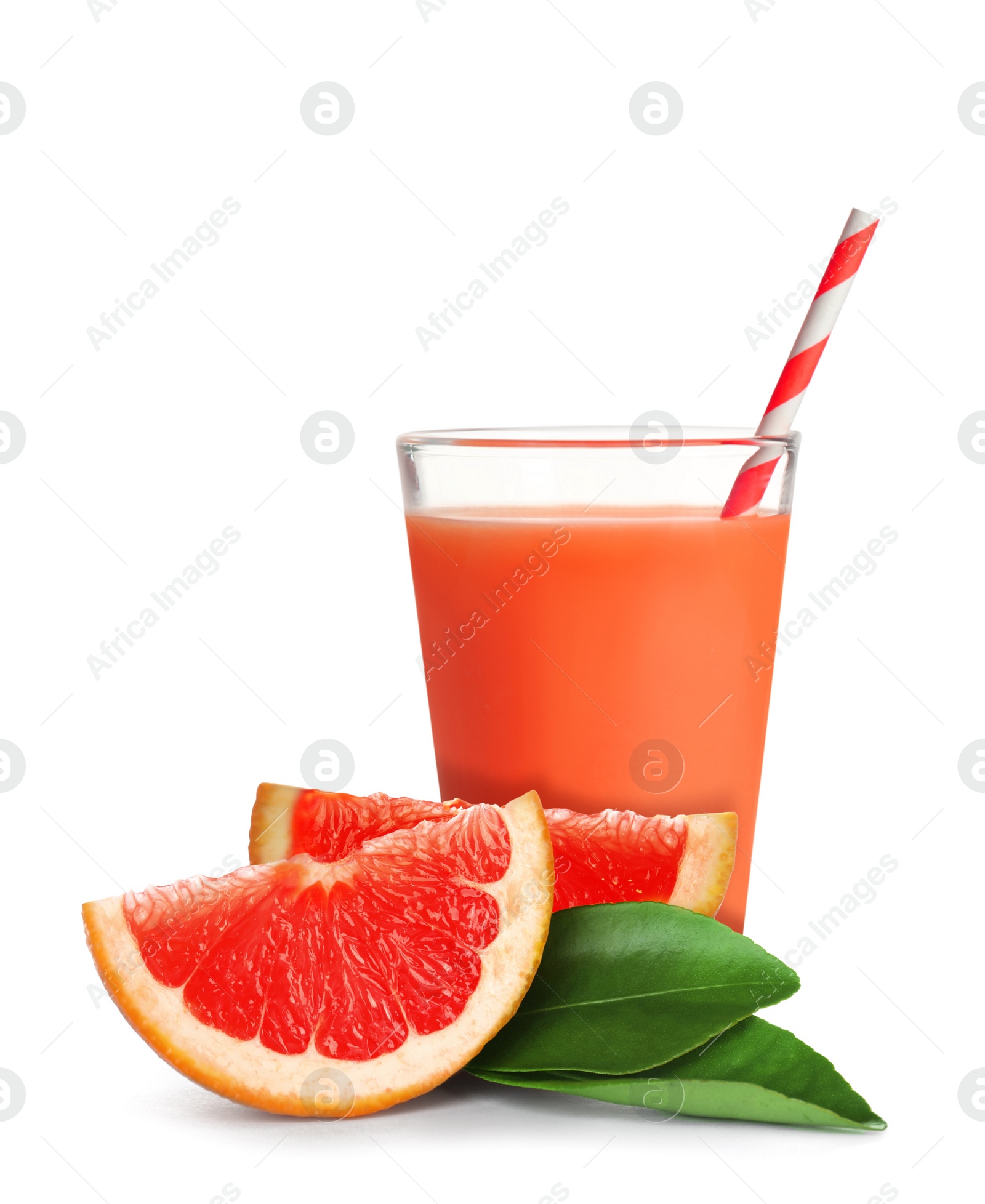 Image of Glass of grapefruit juice, fresh fruit and green leaves on white background