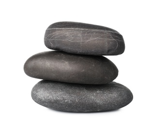 Stack of spa stones on white background