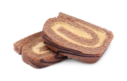 Photo of Slices of tasty chocolate cake roll with cream on white background
