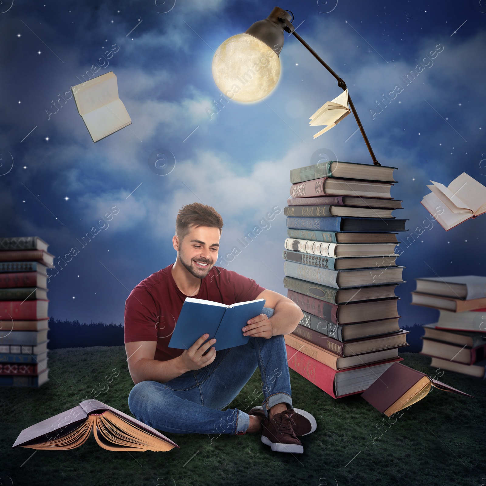 Image of Handsome young man reading and flying books in mystery park