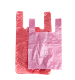 Photo of Stack of plastic bags isolated on white, top view