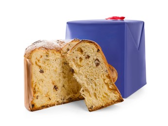 Photo of Delicious cut Panettone cake with powdered sugar and box on white background. Traditional Italian pastry