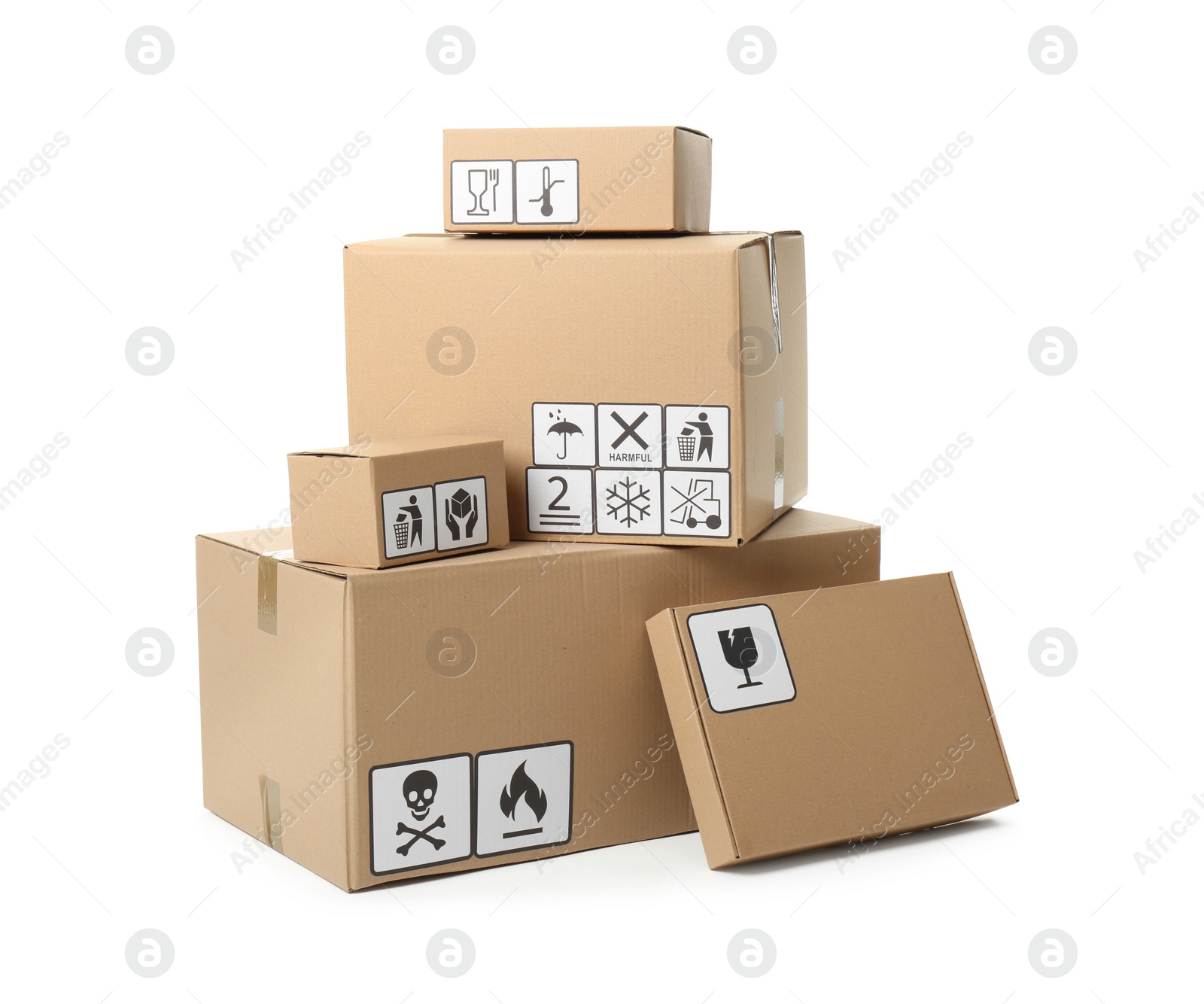 Photo of Cardboard boxes with different packaging symbols on white background. Parcel delivery