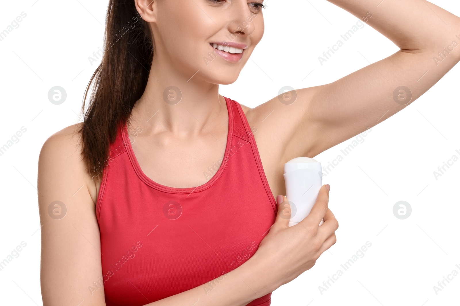 Photo of Beautiful woman applying deodorant on white background