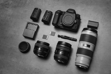 Photo of Professional photographer equipment on gray background