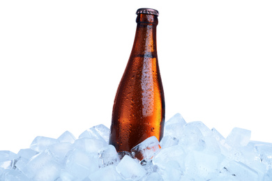 Photo of Ice cubes and bottle on white background