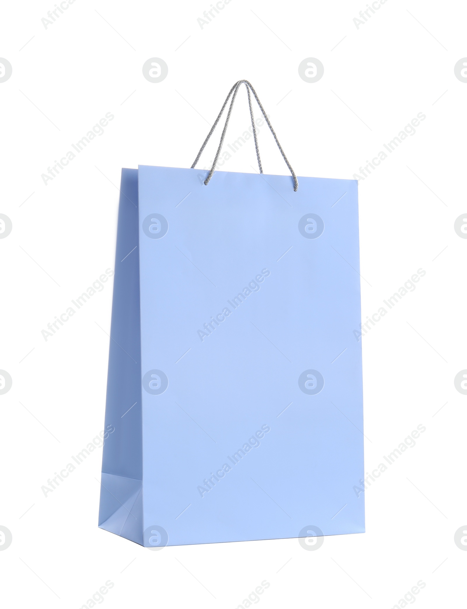 Photo of Light blue paper shopping bag isolated on white