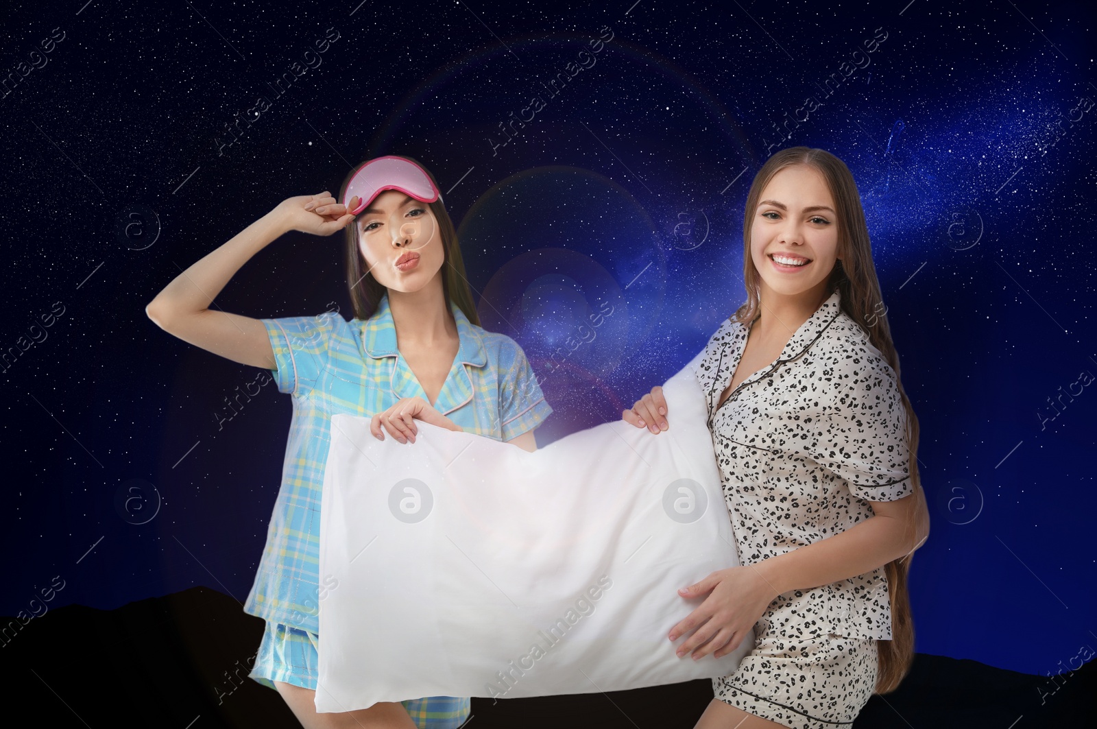 Image of Beautiful women with pillow and night starry sky on background. Bedtime