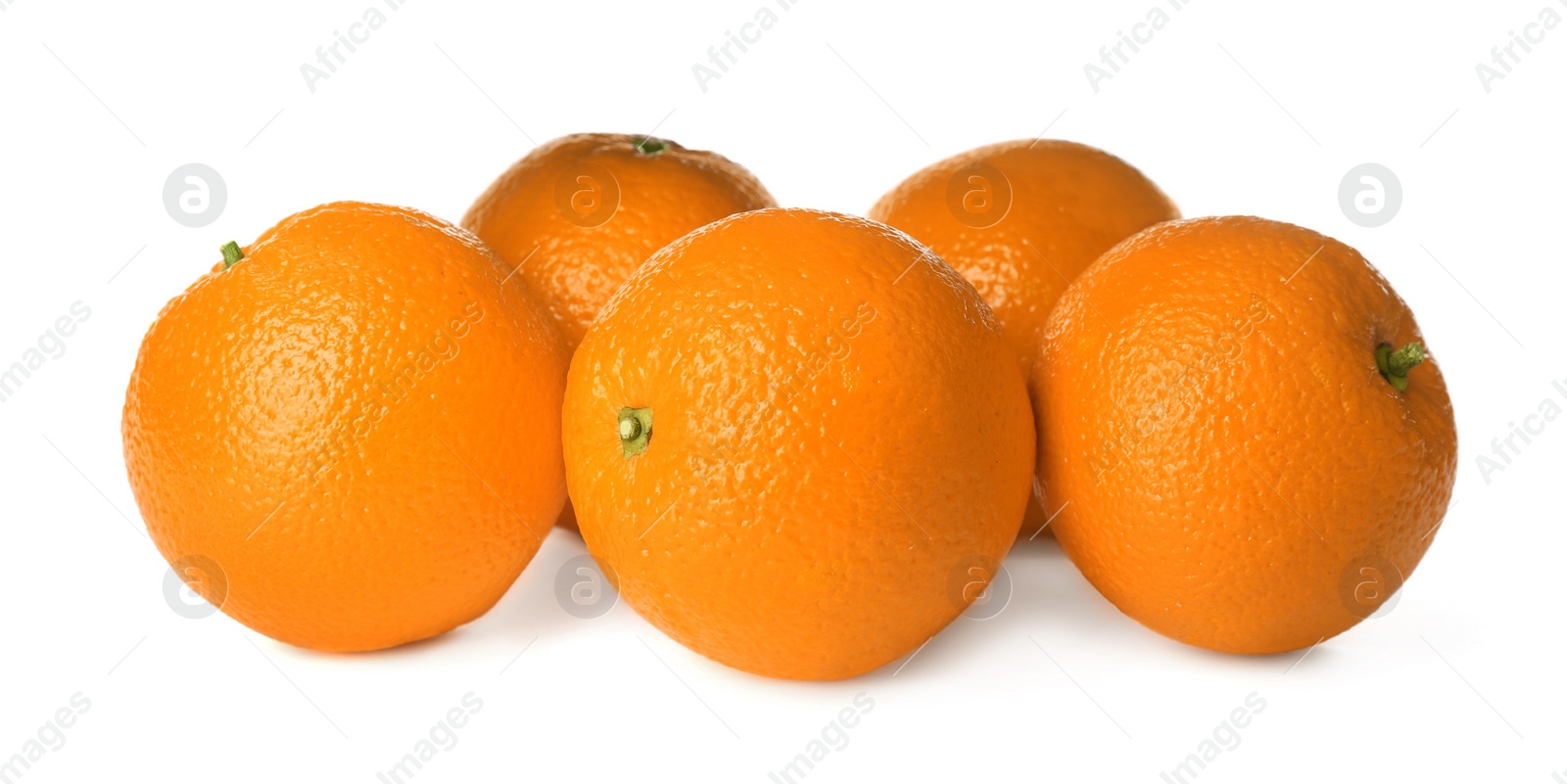 Photo of Delicious fresh ripe oranges on white background