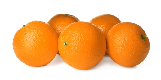 Photo of Delicious fresh ripe oranges on white background