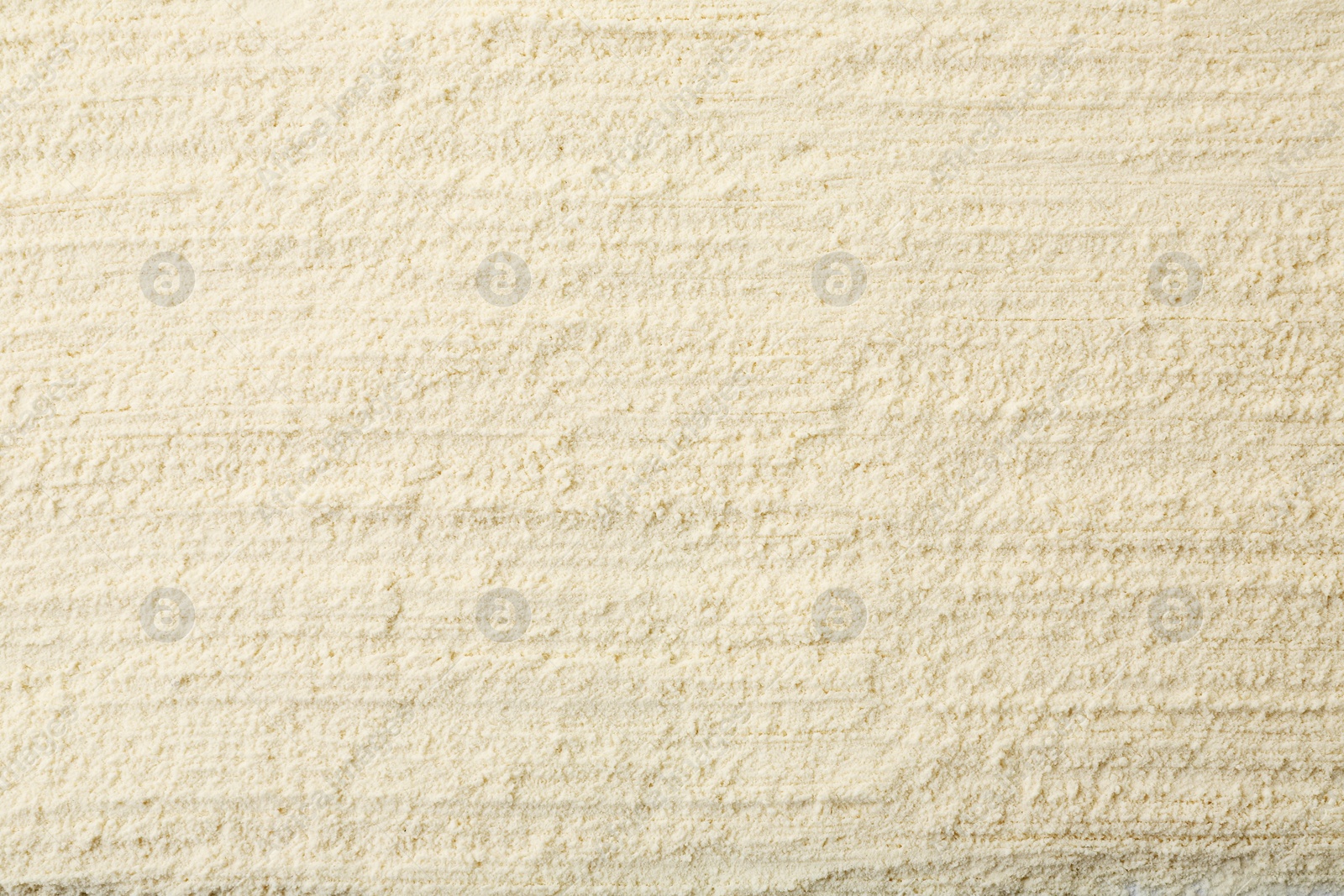 Photo of Texture of baking powder as background, top view