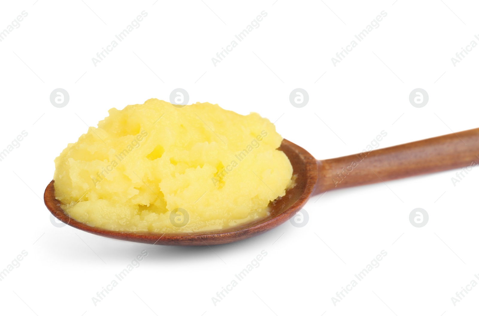 Photo of Wooden spoon of Ghee butter isolated on white