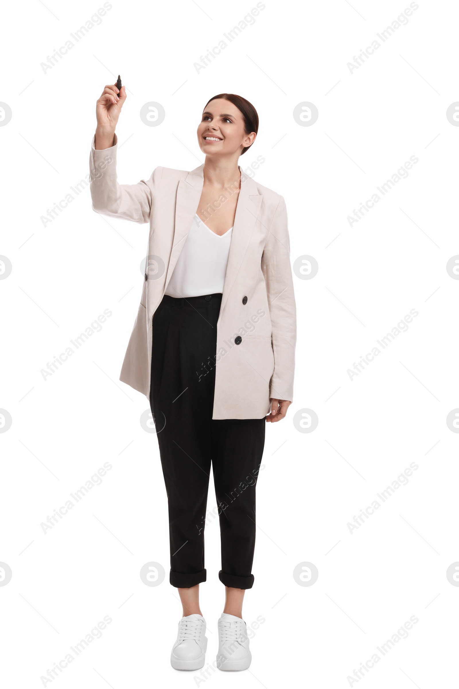 Photo of Beautiful businesswoman in suit with marker on white background