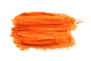 Abstract brushstroke of orange paint isolated on white