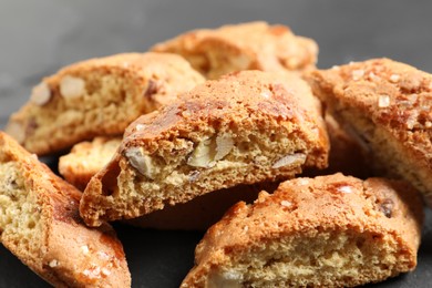 Photo of Traditional Italian almond biscuits (Cantucci) on table, closeup