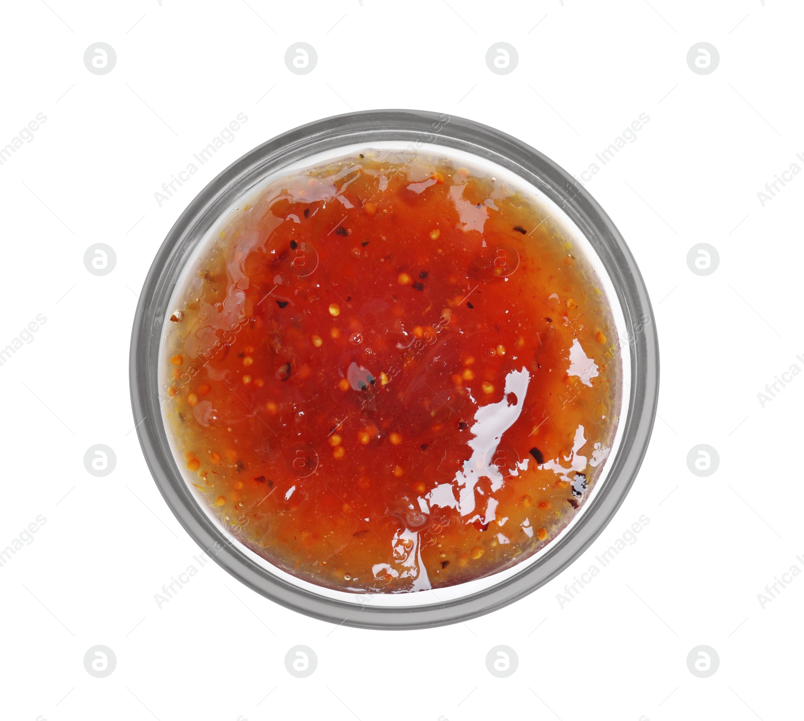 Photo of Glass bowl of tasty sweet fig jam isolated on white, top view