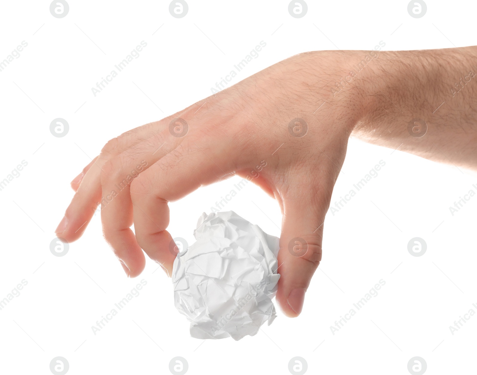 Photo of Man crumpling paper against white background, closeup. Generating idea