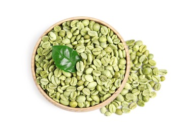Photo of Green coffee beans with leaf on white background, top view