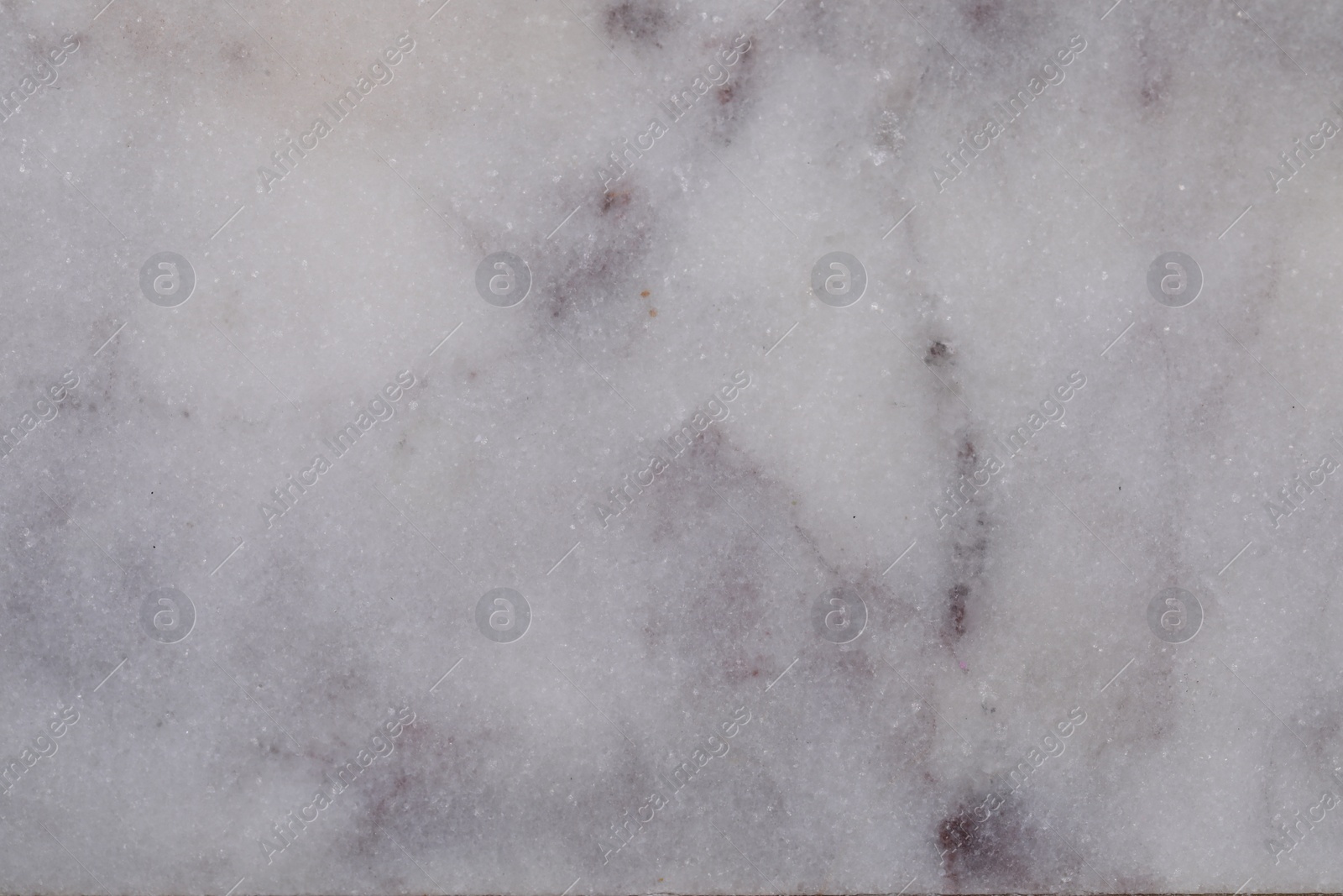 Photo of Texture of light grey marble surface as background, closeup